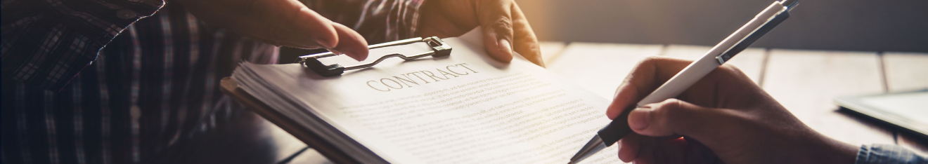 lawyers looking over a contract