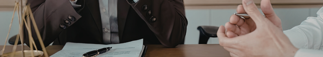 female lawyer looking over a contract